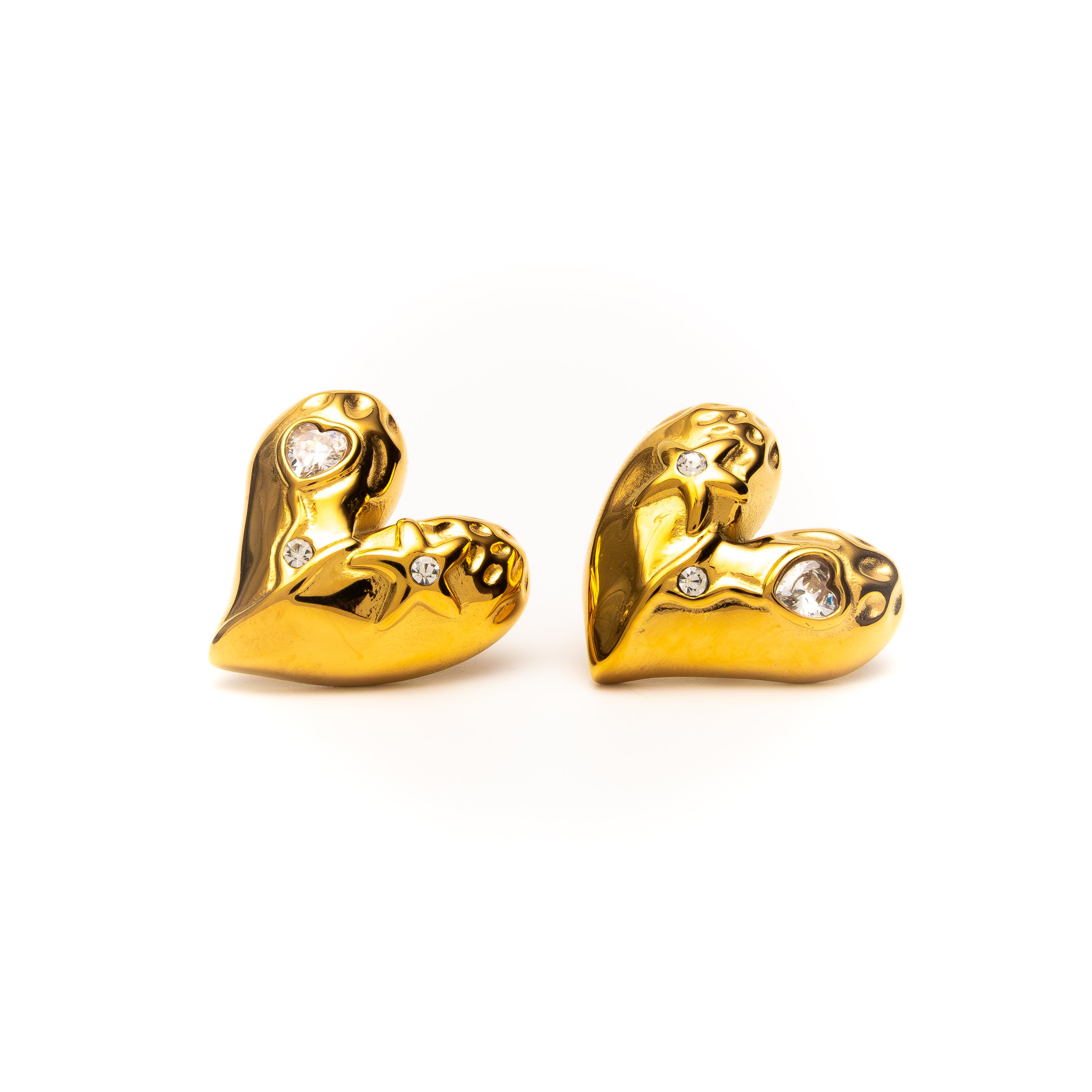 Pair of gold heart-shaped earrings on a white background