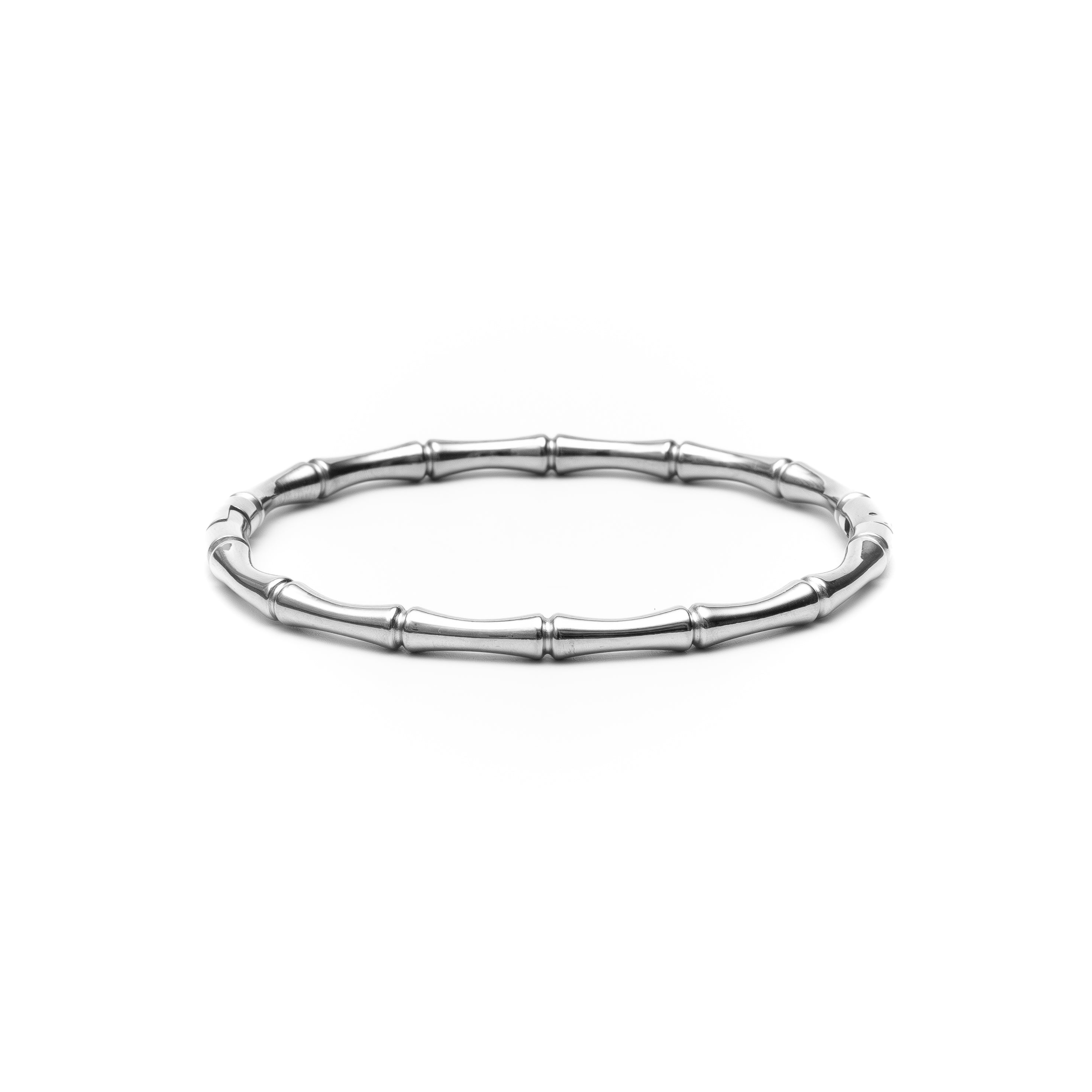 Silver bracelet with a bamboo design on a white background