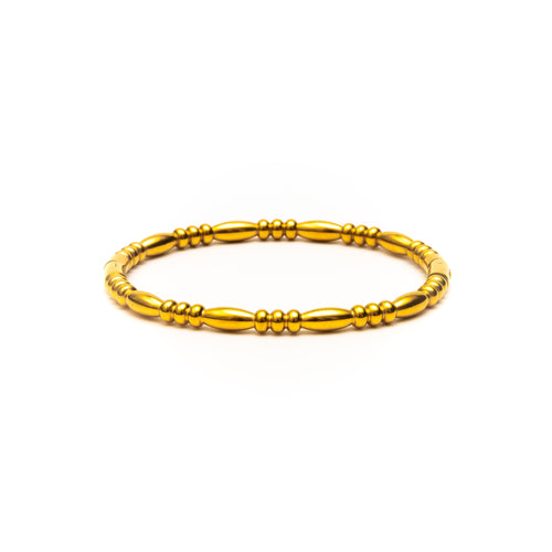 Gold bracelet on a white background