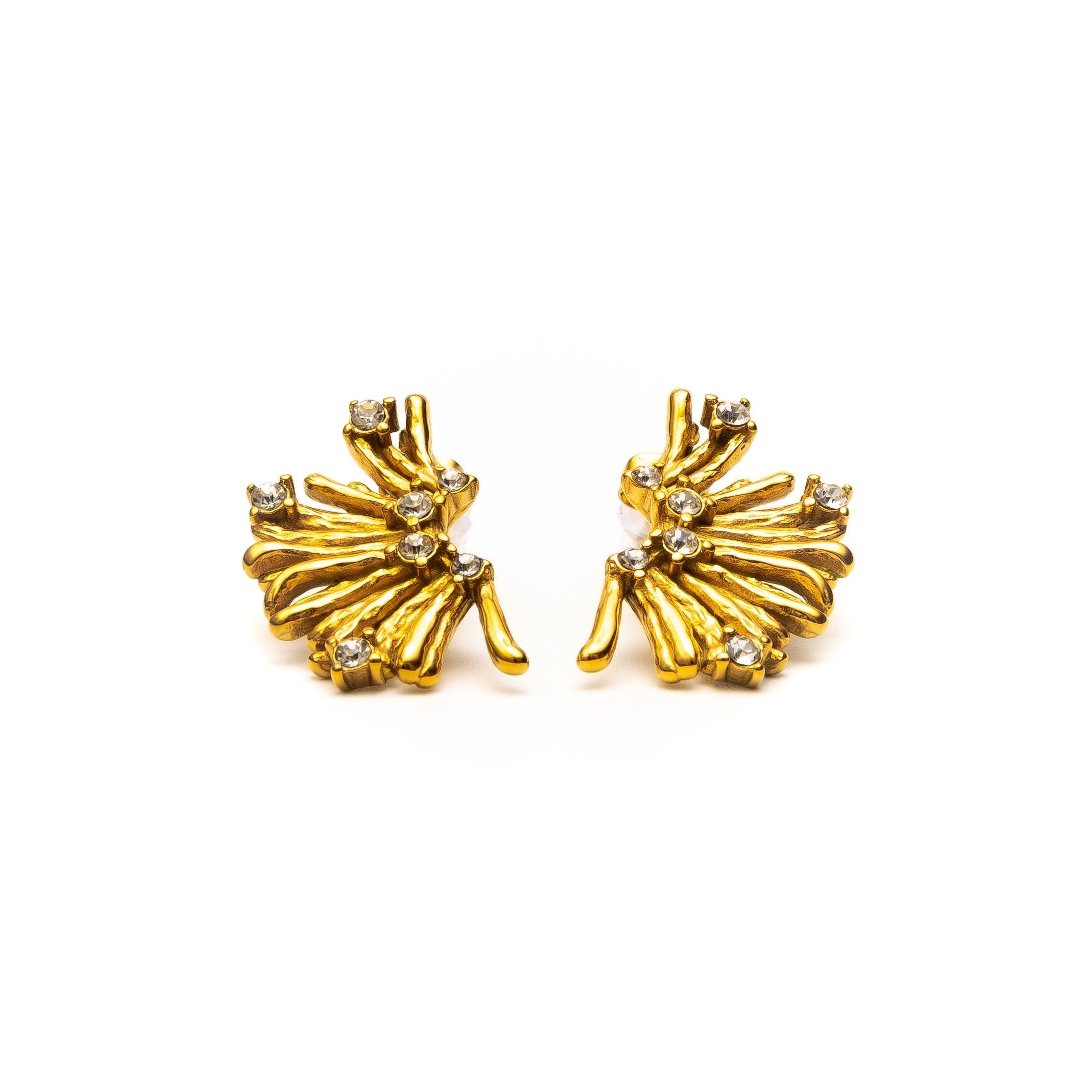 Pair of gold earrings with gemstones on a white background