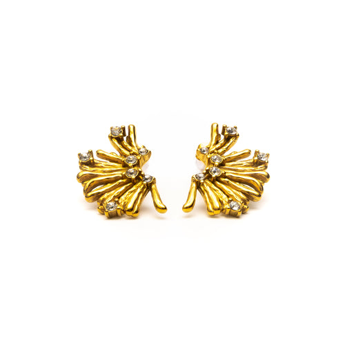 Pair of gold earrings with gemstones on a white background