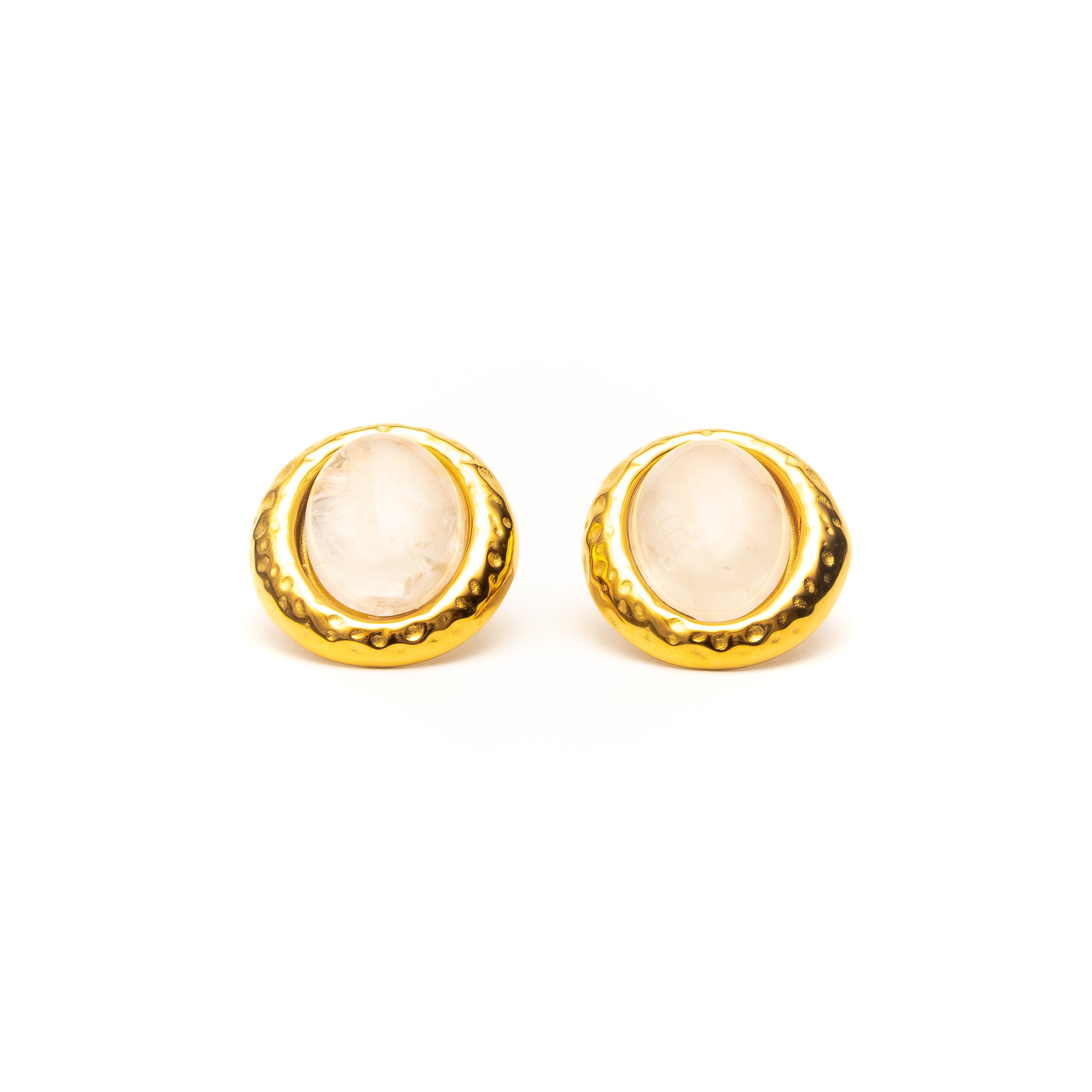 Pair of gold earrings with white stones on a white background