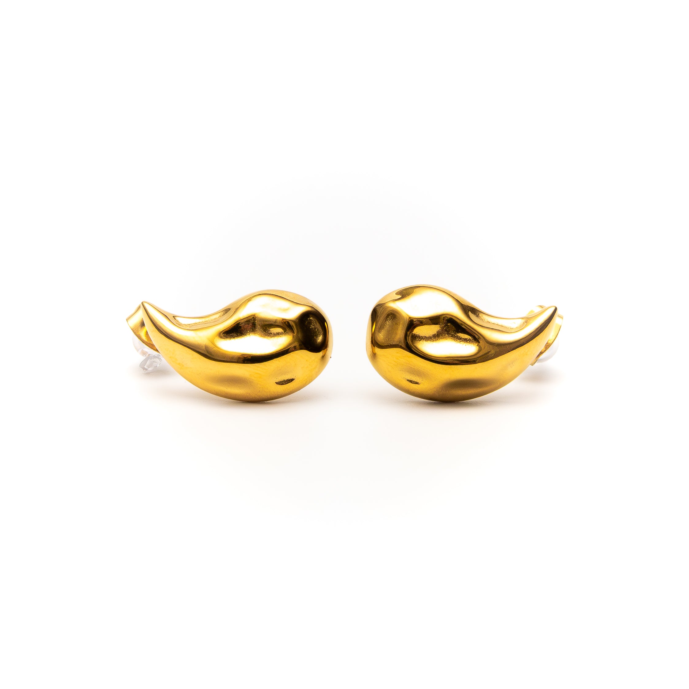 Pair of gold earrings on a white background