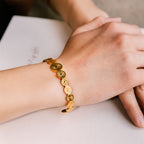 Maribel Cuff gold bracelet for women on white background