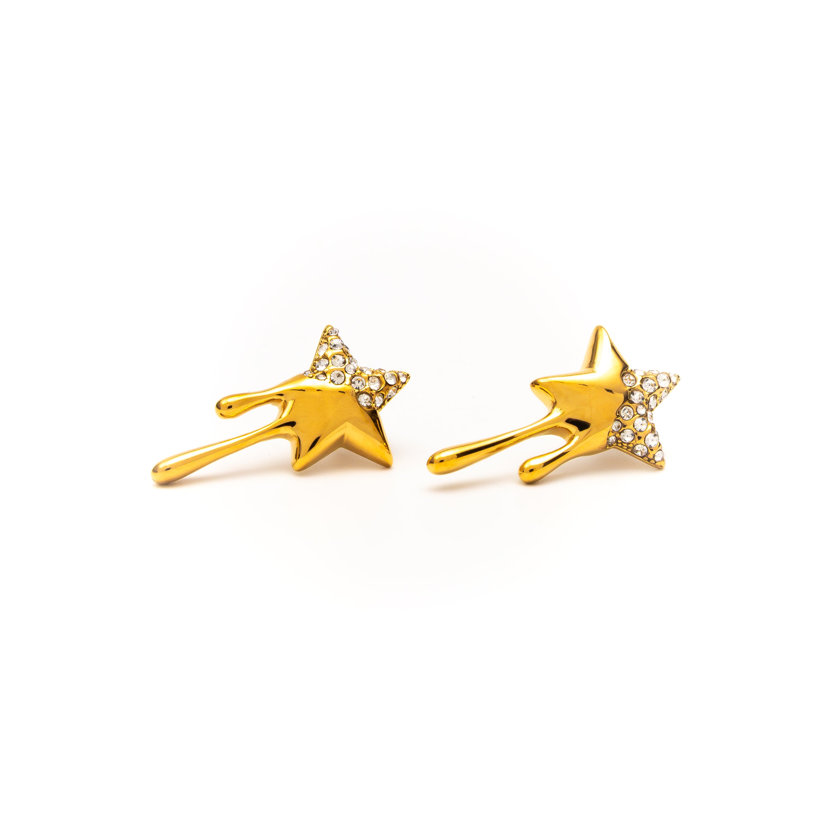Gold star-shaped earrings with small stones on a white background