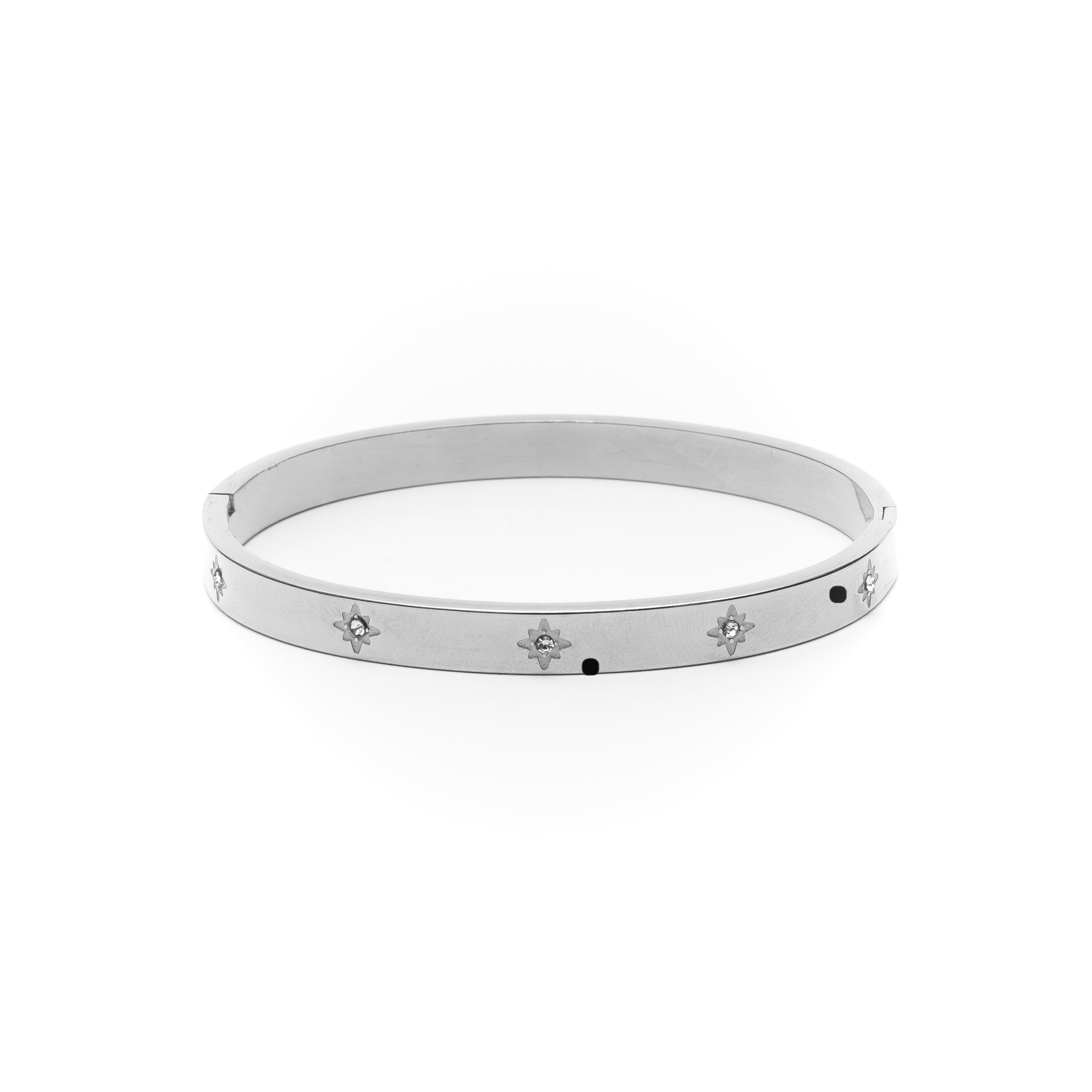 Silver bracelet with star designs on a white background
