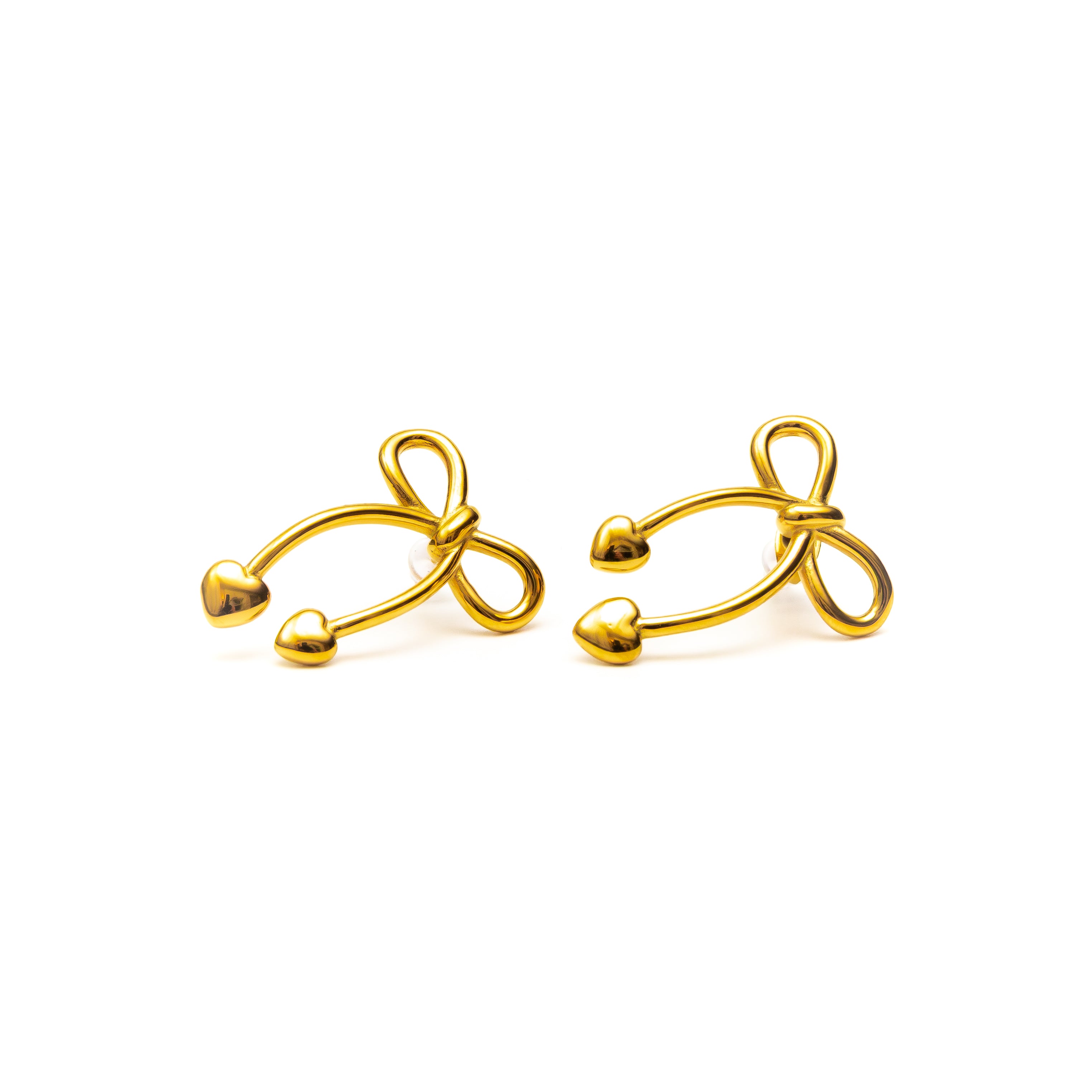 Pair of gold bow-shaped earrings on a white background