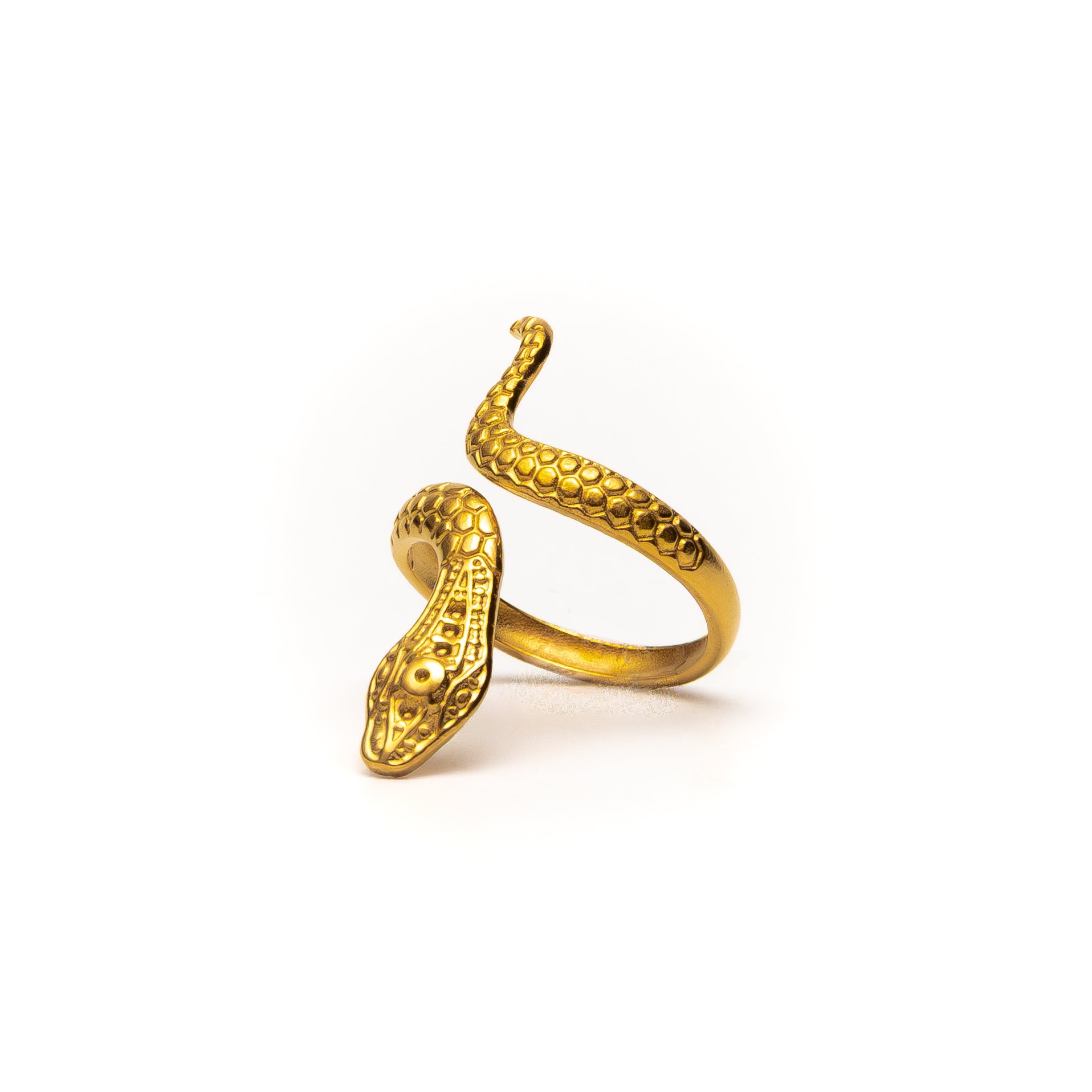 Gold snake-shaped ring on a white background