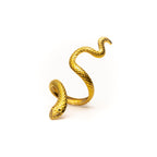 Gold snake-shaped ring on a white background