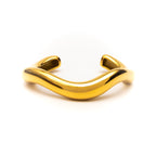 Gold bracelet on a white background